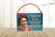 Load the picture into the gallery viewer, Deko Blechschild Aufhänger Nichts ist im Leben wichtiger als das Lachen. Lachen bedeutet Stärke, Selbstvergessenheit und Leichtigkeit. Tragödien sind dagegen etwas völlig Albernes.